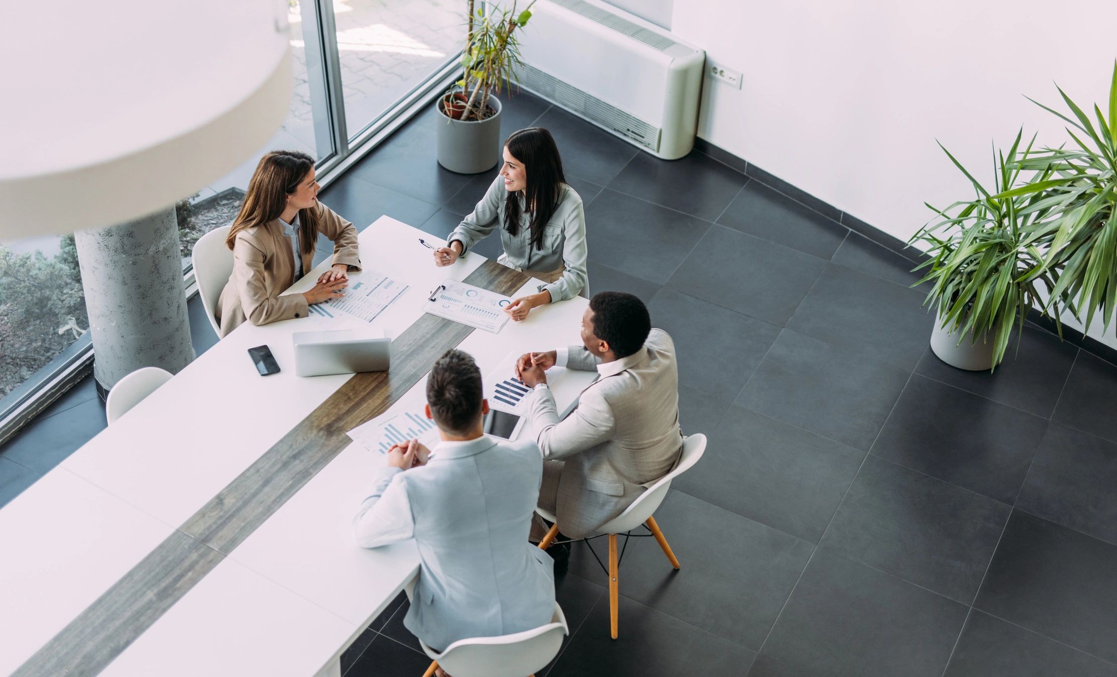 Professional finance advisory team meeting in office